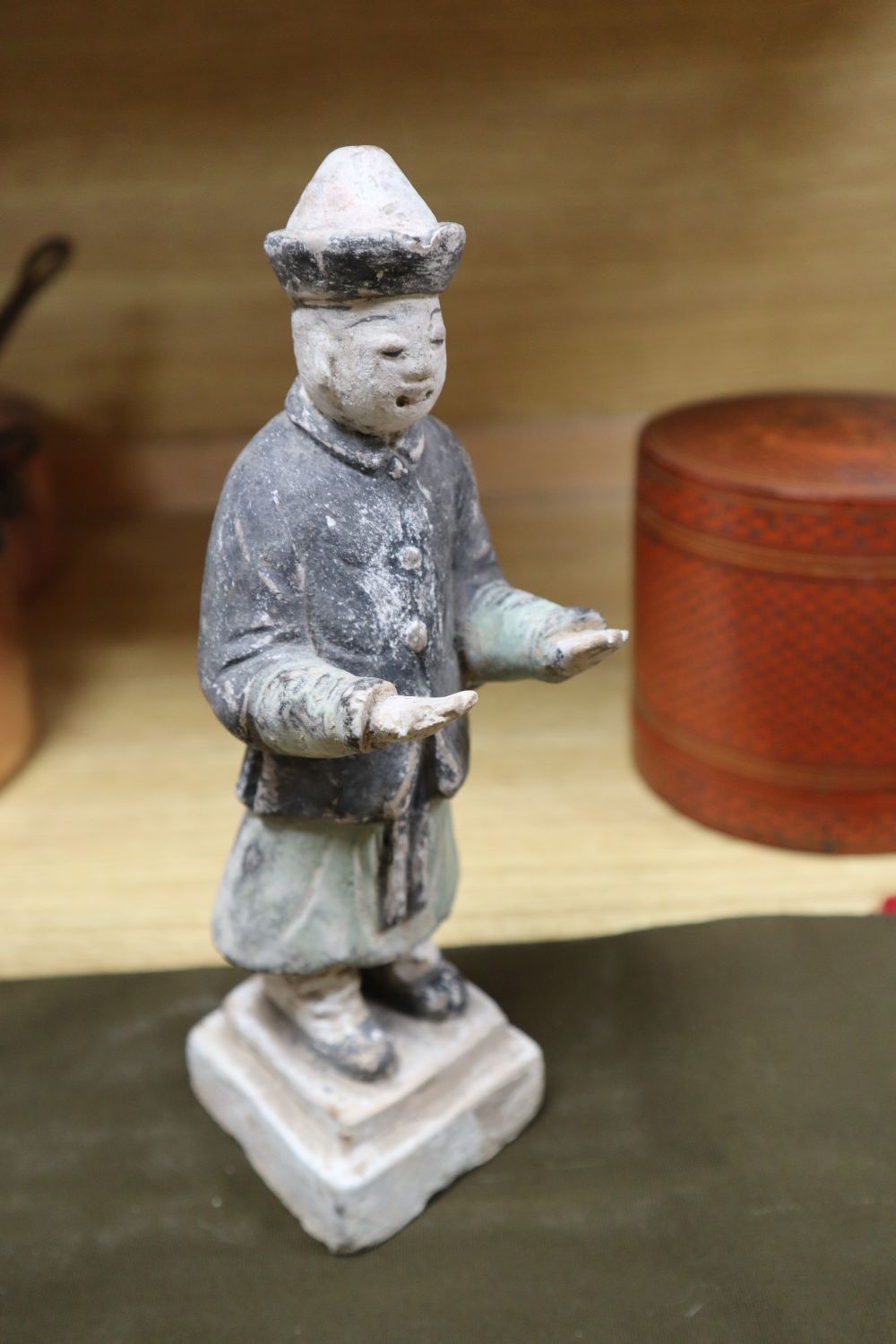 A small group of Asian collectables, including a Chinese funerary figure,